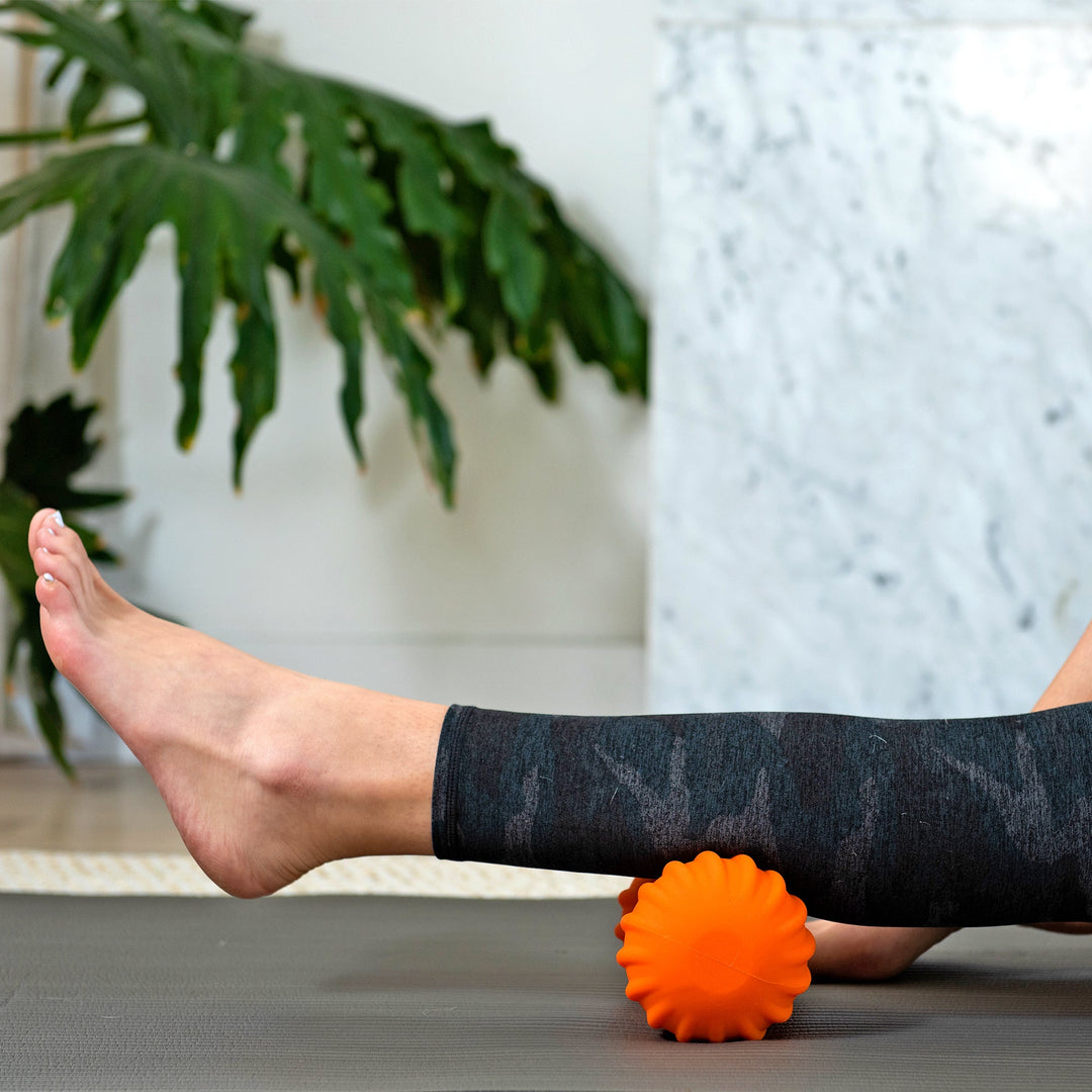 Vibrating Peanut Massage Ball Roller with 4 Intensity Levels Brookstone Vibrating Peanut Massage Ball Roller with 4 Intensity Levels Brookstone