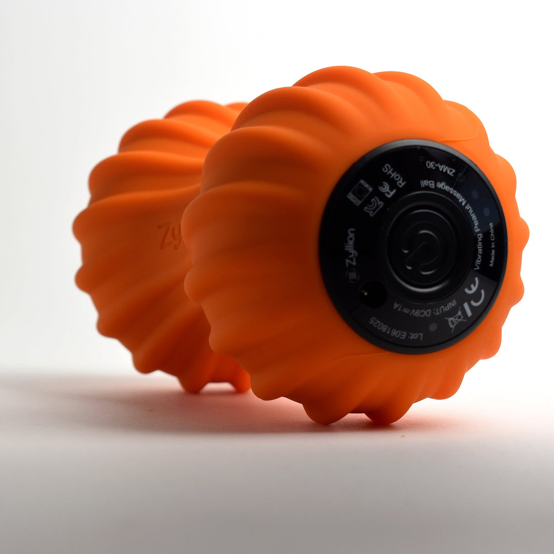 Vibrating Peanut Massage Ball Roller with 4 Intensity Levels Brookstone Vibrating Peanut Massage Ball Roller with 4 Intensity Levels Brookstone