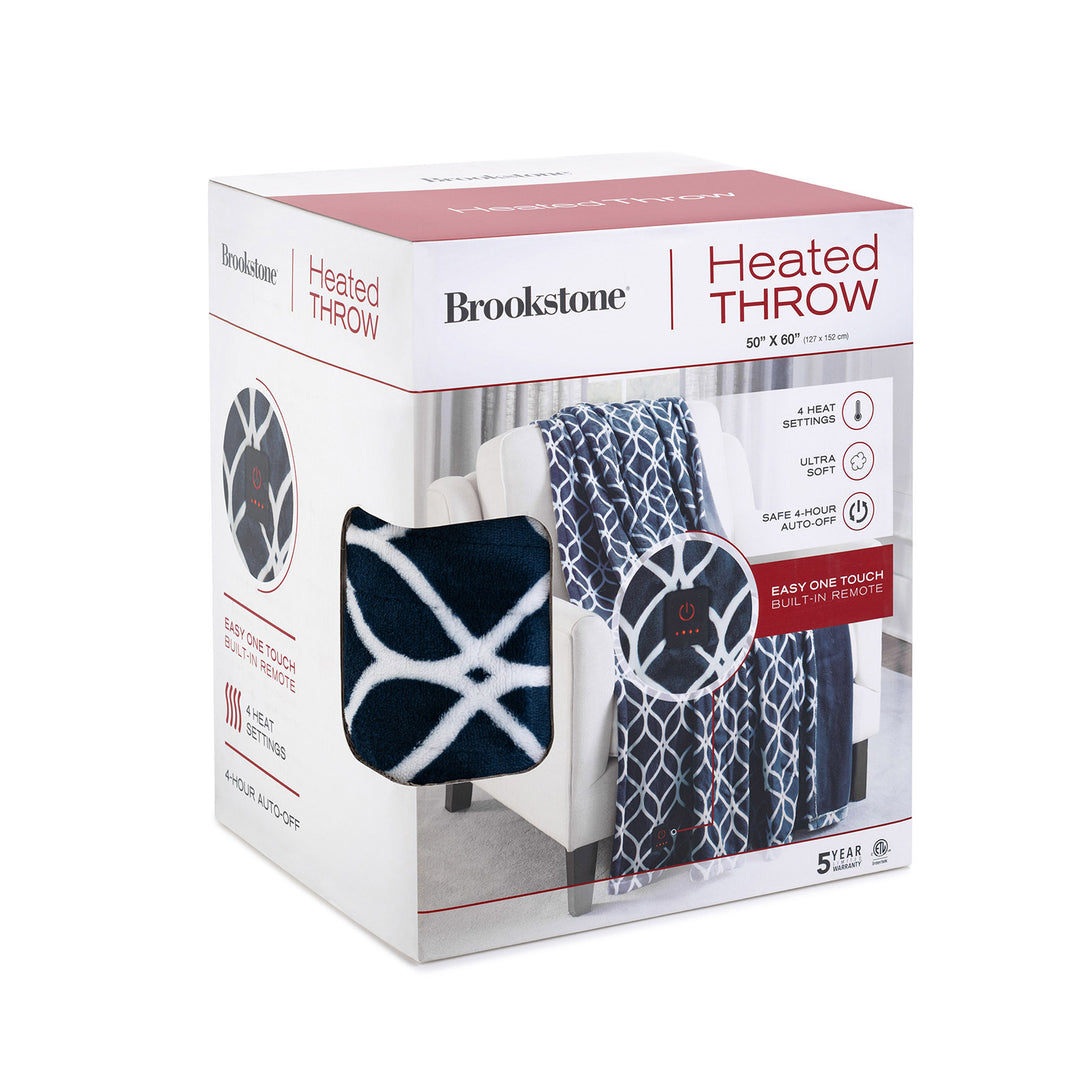 Brookstone Heated Throw packaging showing the navy trellis blanket, built-in control button, and product features.