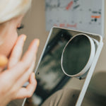 Brookstone Light-up Vanity Makeup Mirror 10x Magnification with Bluetooth Speakers and Qi Wireless Charging Stand