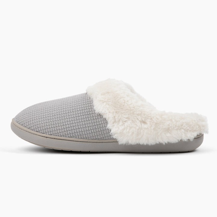 Gray slipper with white fur trim on a white background