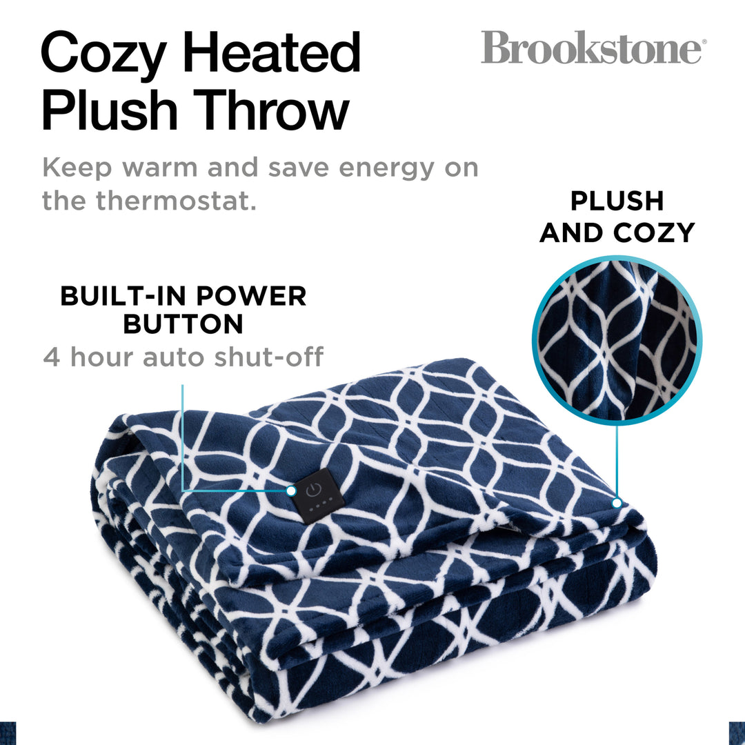 Cozy heated plush throw blanket with patterned design on a white background, featuring Brookstone branding.