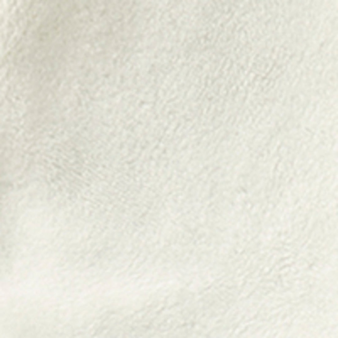 Close-up of a textured white fabric surface