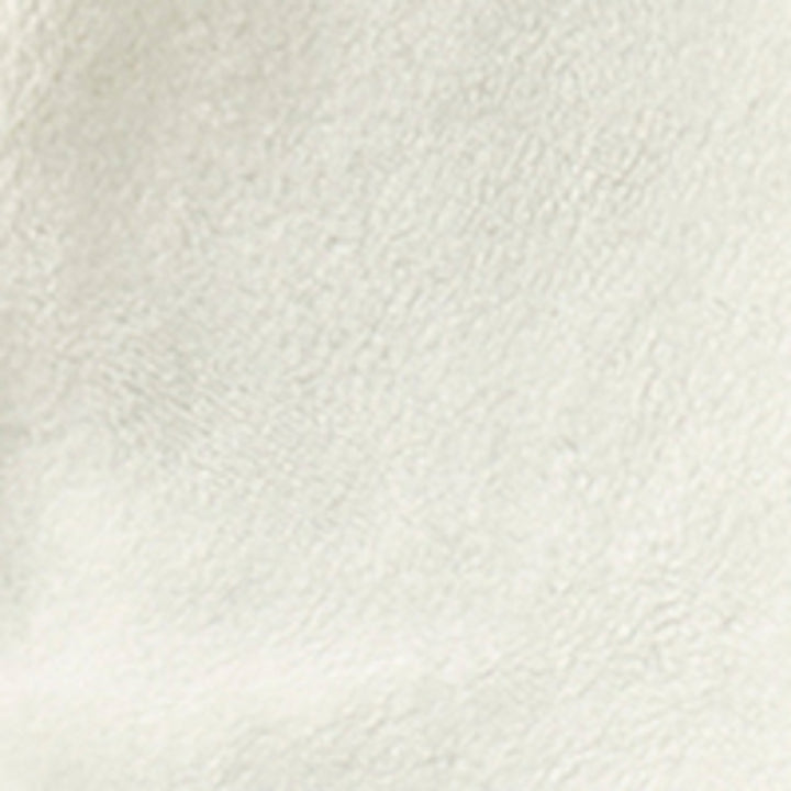 Close-up of a textured white fabric surface