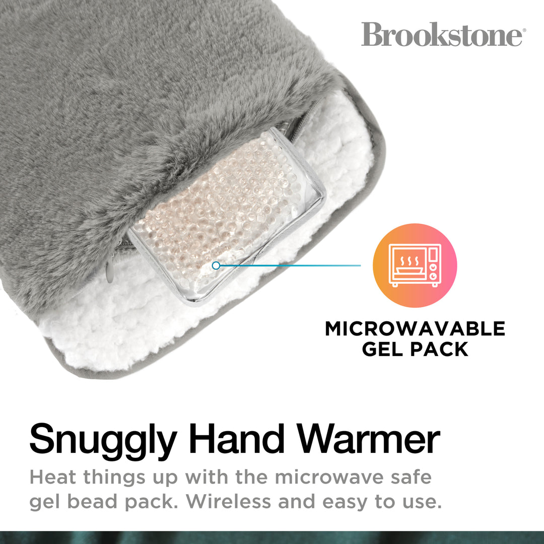 Snuggly hand warmer with a microwavable gel pack, featuring Brookstone branding.