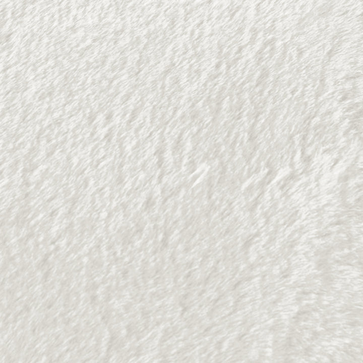 Close-up of a textured white fabric surface