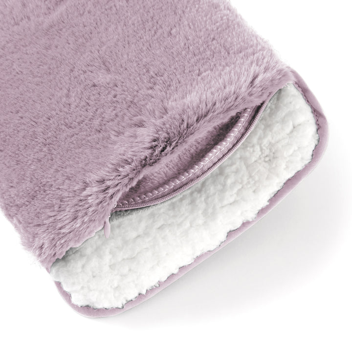 Purple plush hand warmer with white interior on a light gray background