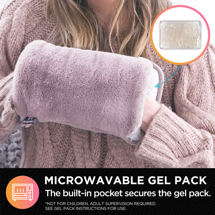 Person wearing a pink microwavable gel pack in a pocket, with an inset showing the gel pack.