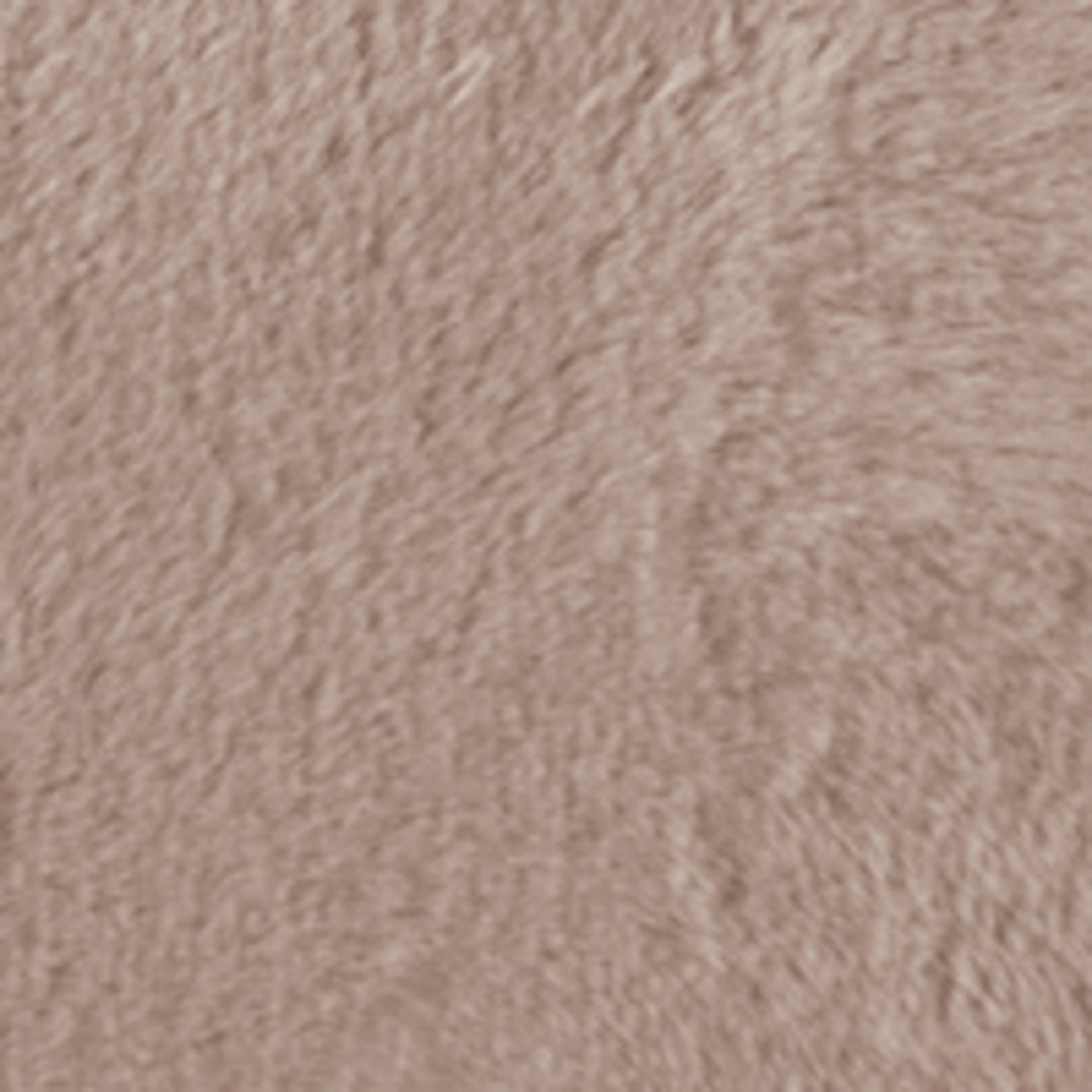 Close-up of a textured pinkish-brown fabric surface