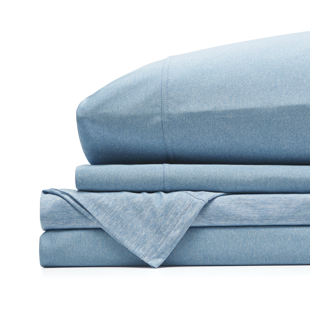 Set of light blue denim-style sheets on a white background