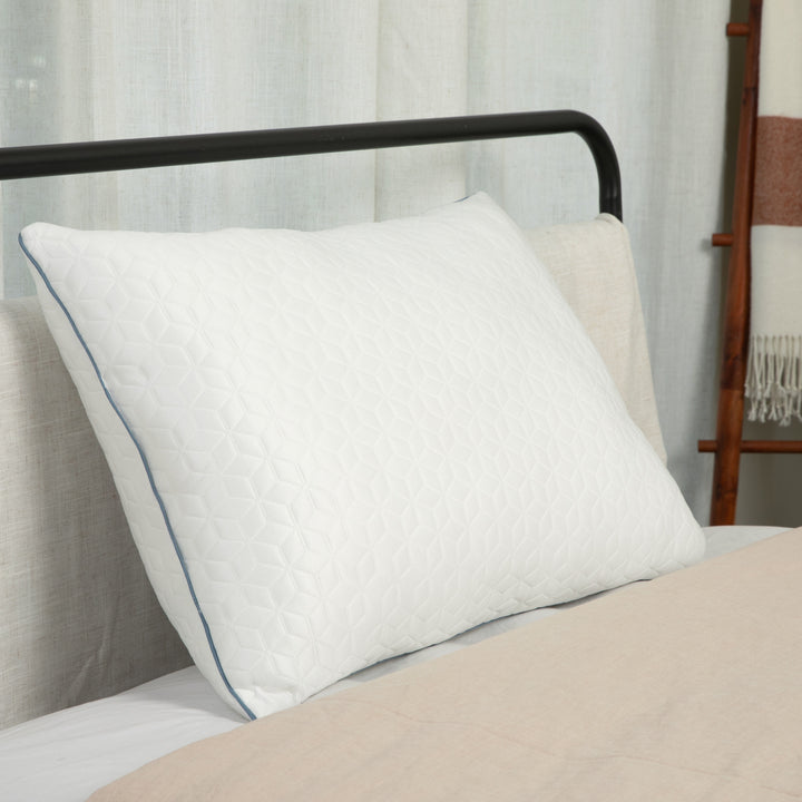 Brookstone CoolSense Down Alternative Pillow on bed