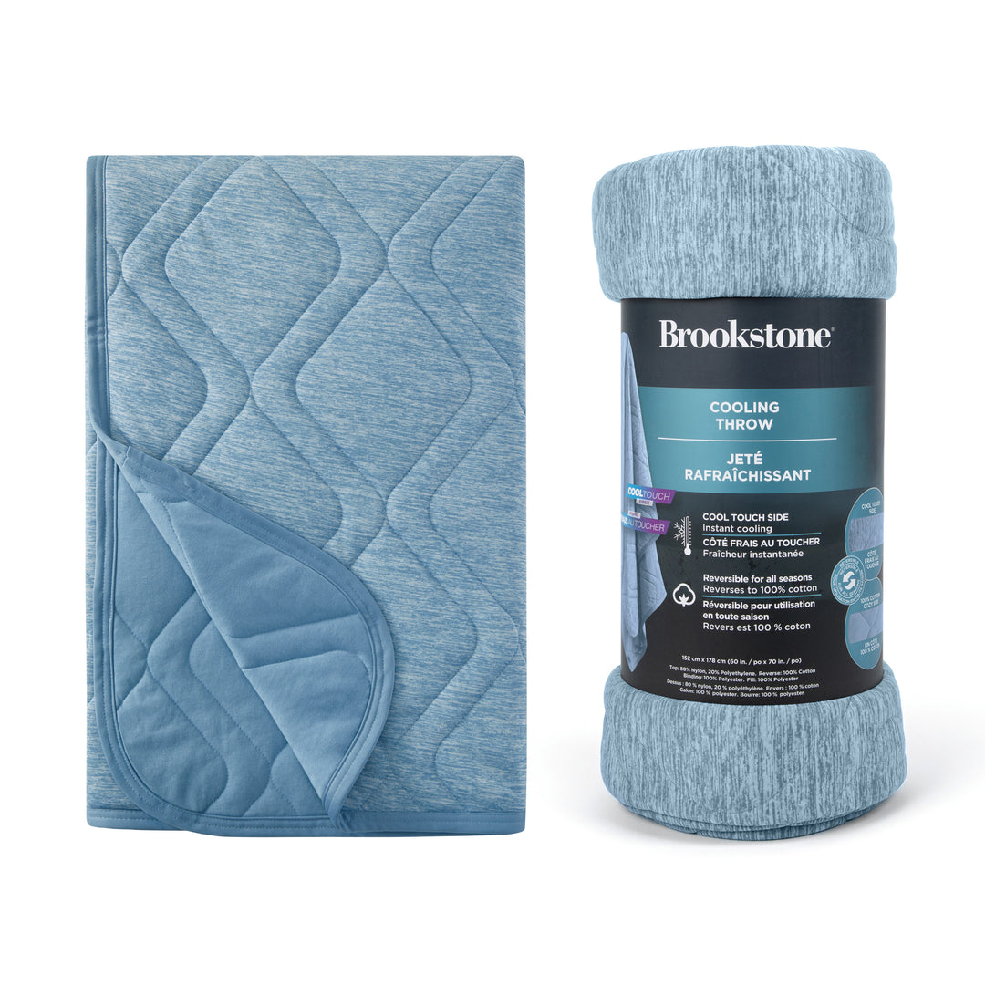 Blue cooling throw blanket with packaging on a white background