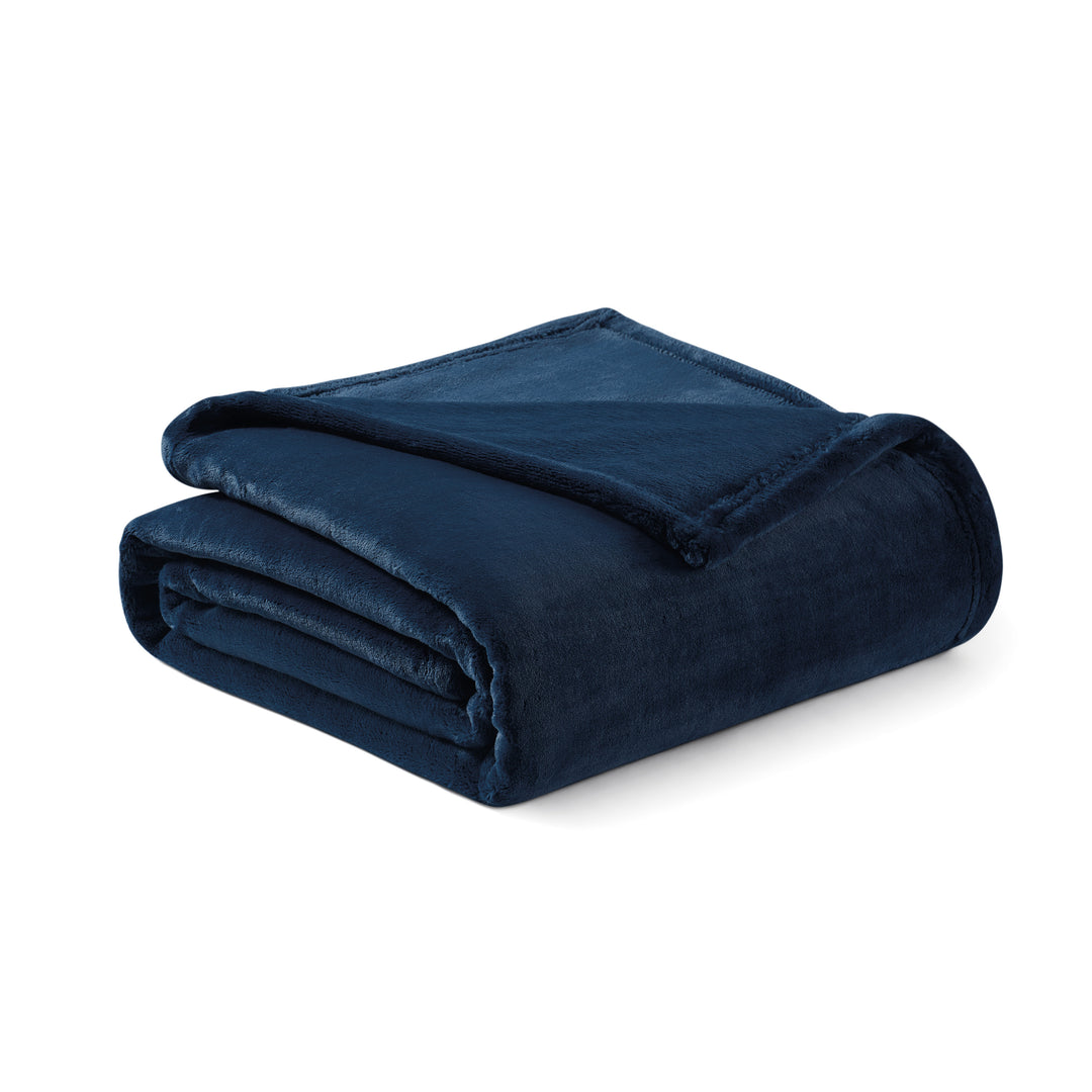 Folded Navy plush throw blanket showing soft texture and finished edges.