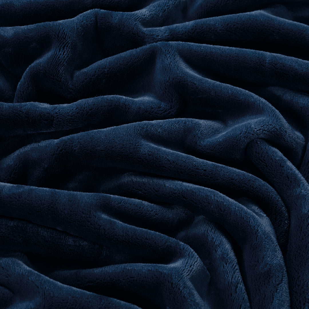 Close-up of a dark blue textured fabric