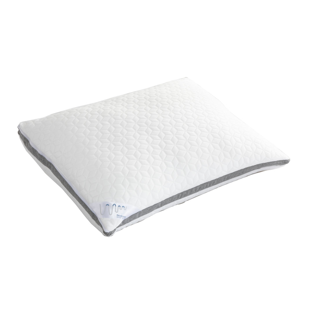 White pillow with gray accents on a white background