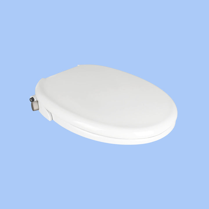 3/4 view closed lid, TUSHY Wave with a platinum control knob, on a blue background.