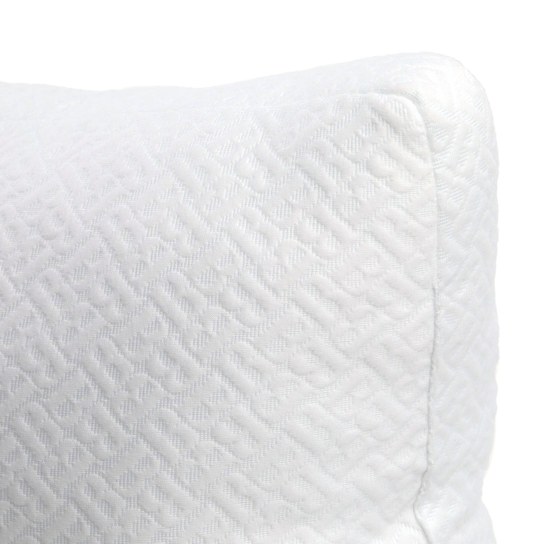 Close-up of a textured white fabric with a subtle pattern on a white background
