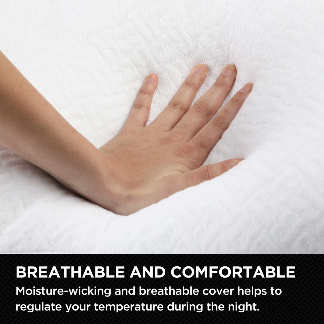 Hand resting on a textured white cover with text about breathability and comfort.