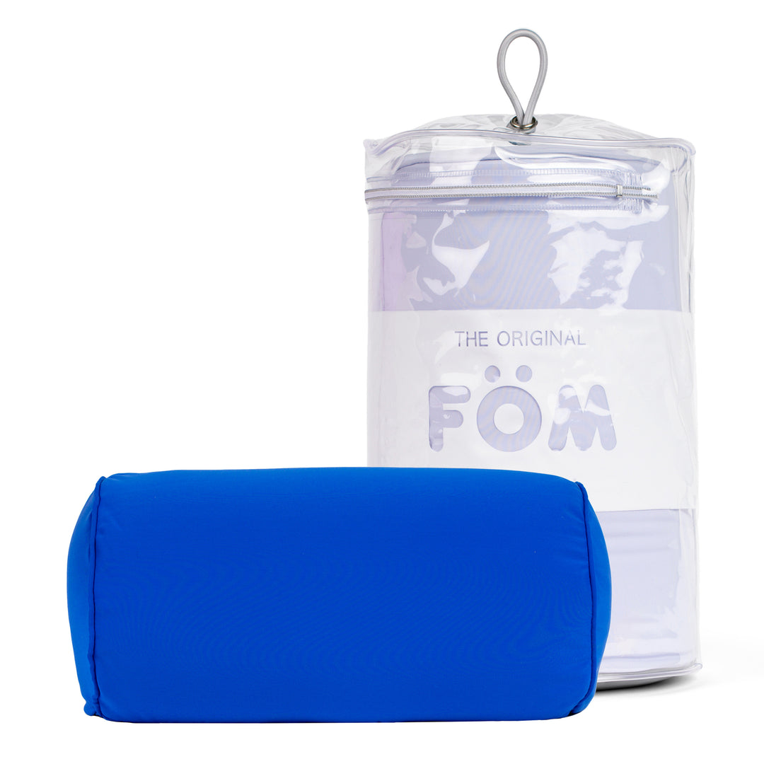 Blue cushion with clear packaging labeled 'FOM' on a white background
