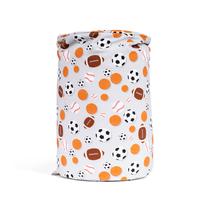 Cylindrical pillow with sports-themed pattern on a white background