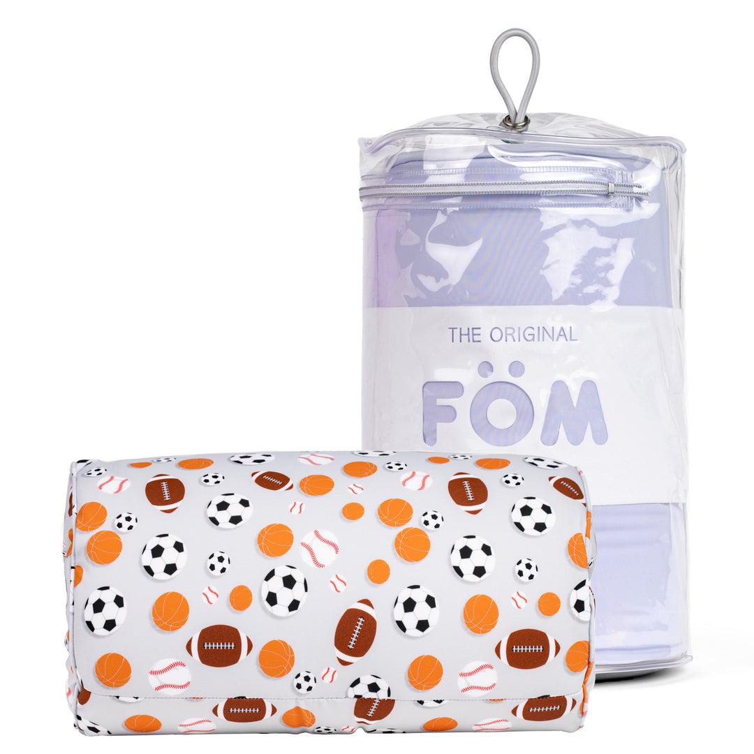Clear container with a lid and a pouch with sports ball pattern on a white background