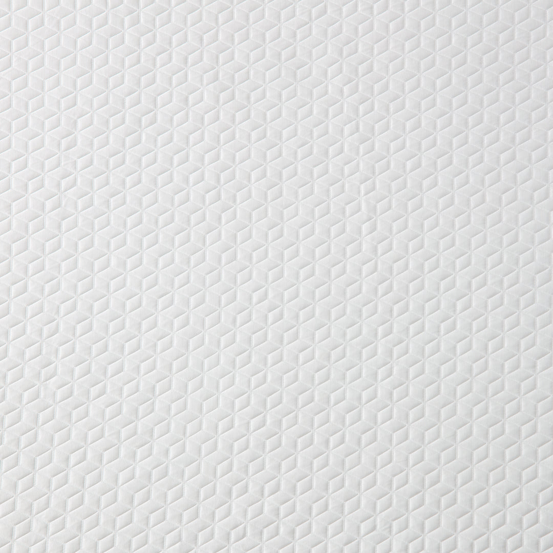 Close-up of a textured white surface with a subtle pattern