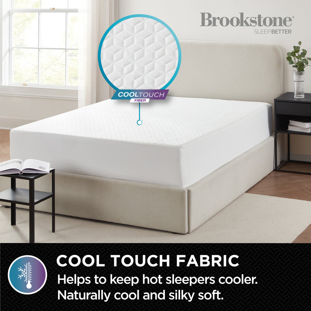 Mattress with cool touch fabric feature in a bedroom setting, Brookstone brand visible.