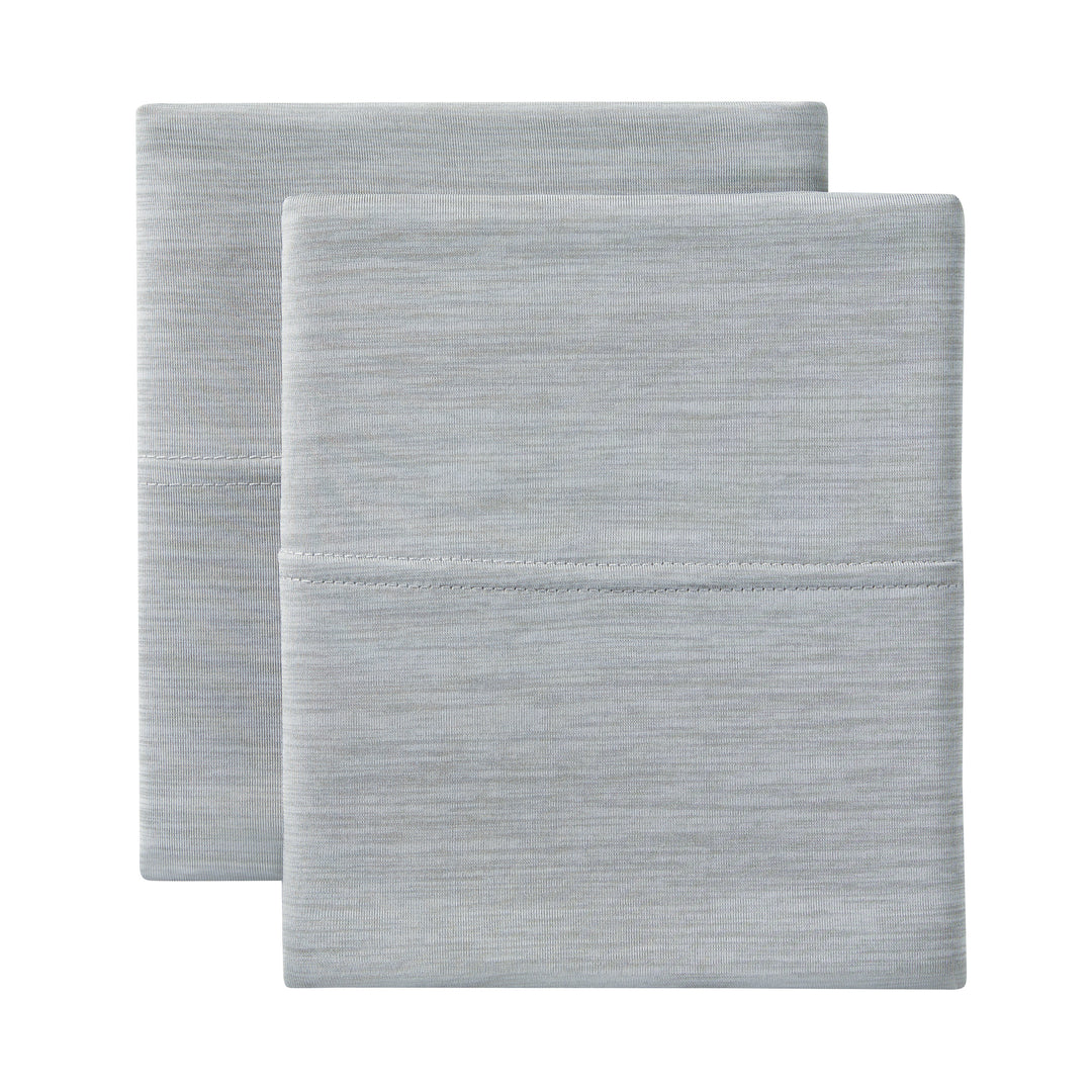 Two gray textured pillows on a white background
