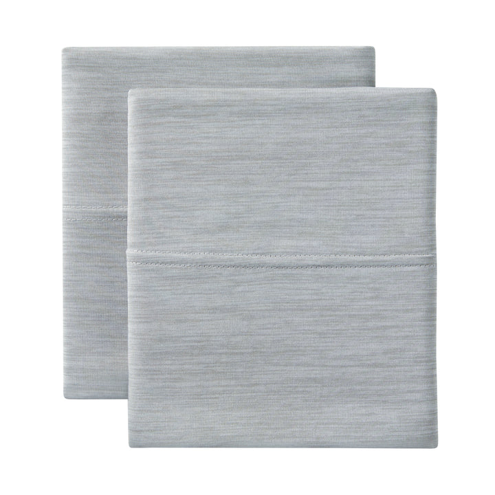 Two gray textured pillows on a white background
