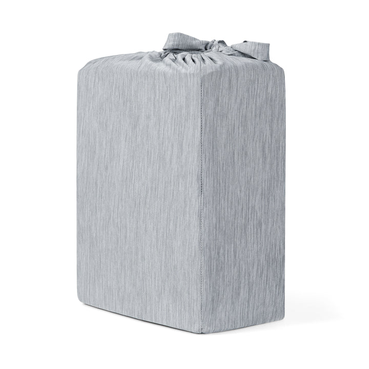 Gray striped ottoman on a white background