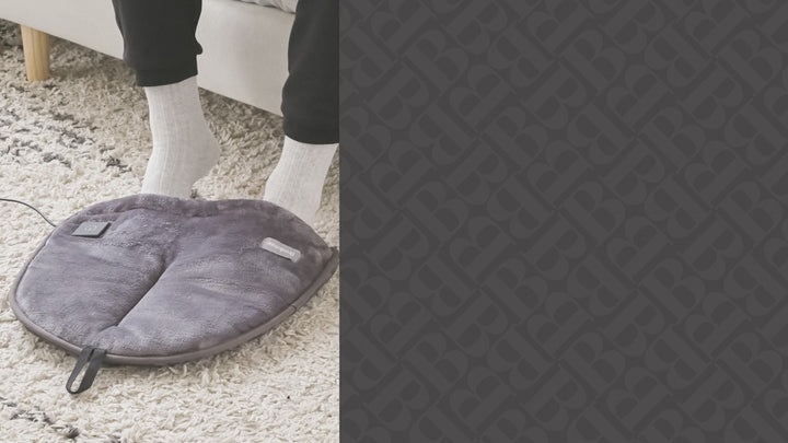 Brookstone heated foot warmer in charcoal, plush design for warmth and comfort.