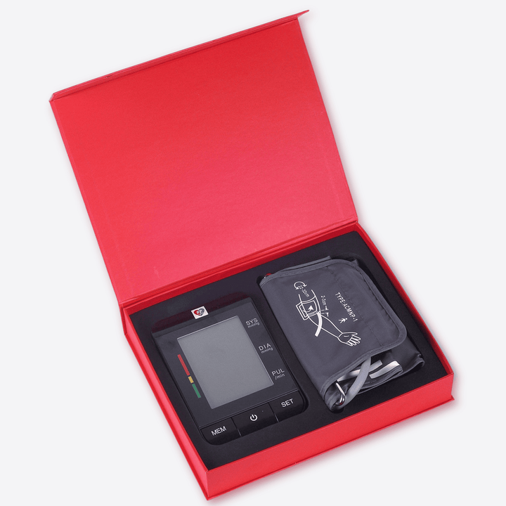 Wizard Research Blood Pressure Monitor with digital screen and arm cuff stored in red box packaging