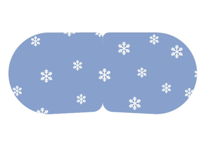 Single use cooling eye mask in blue with white snowflake design, for reducing morning puffiness

