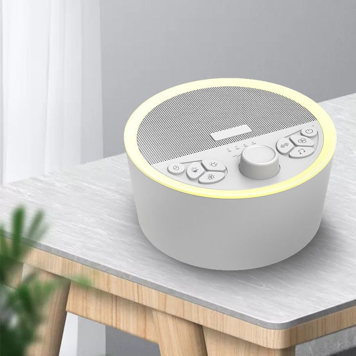 Wizard Research white noise sleep sound machine with soothing night light on bedside table
