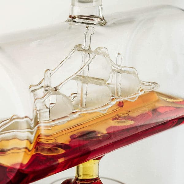 Whiskey Decanter with Antique Ship With 4 Globe Glasses